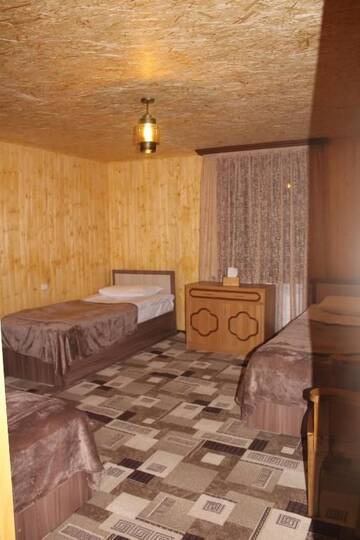 Фото номера Апартаменты с видом на сад Гостевой дом Nayada Rest House г. Lermontovo 10